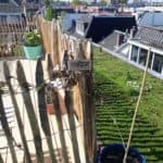Frans schapenhek kastanje 100 hoog, latafstand 4 cm als afscheiding op een dakterras