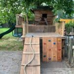 Speelhuis voor kinderen van douglas planken en kastanjehouten palen| Adéquat